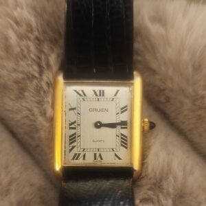 Gruen Women's Gold and Black Watch